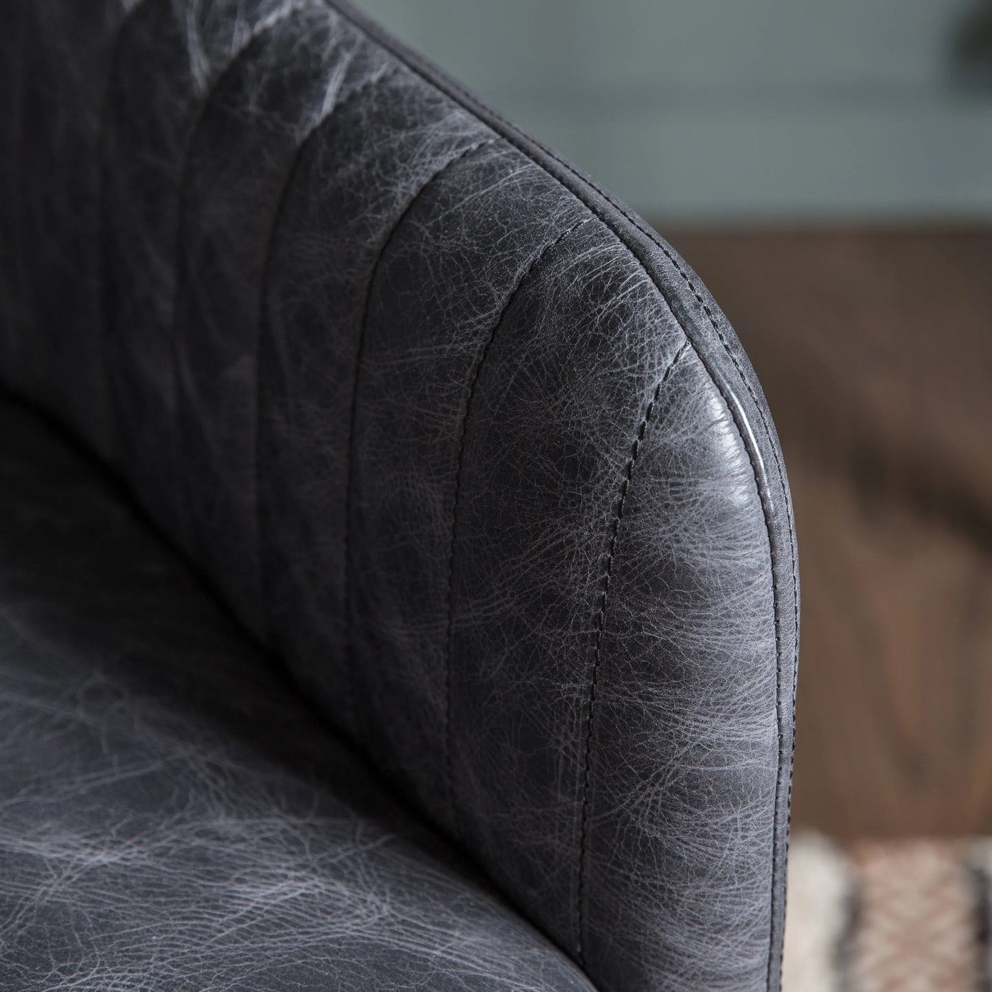 Gallery Direct Curie Swivel Chair in Antique Ebony Leather